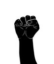 Black silhouette of a male rising fist on a white background with white lines defining fingers and thumb. Symbol of