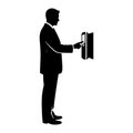 Man in suit touches screen touching device Royalty Free Stock Photo
