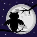 Black silhouette of an owl, a bird sitting on a tree branch against the background of the full moon