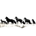 Black silhouette of pack of wolves on white background