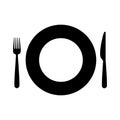 black silhouette plate and pieces of cutlery