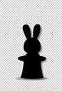 Black silhouette of rabbit sitting in the magic cylinder top hat