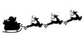 Black silhouette of Santa flying in a sleigh with reindeer. Royalty Free Stock Photo