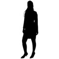 black silhouette of slender girl with long hair in short dress Royalty Free Stock Photo