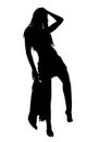 Black silhouette of a slender young barefoot girl who holds a jacket in her hands, and who beautifully poses and flaunts in front