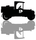 The black silhouette of a vintage tank truck