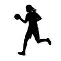 Black silhouette of a women's handball girl player runs with a ball in her hand in a profile