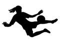 Black silhouette of a young girl goalkeeper of a school women's football team jumping to catch the ball Royalty Free Stock Photo