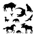 Black silhouettes of North American animal. Isolated image of elk, bison, crocodile on white background. Wildlife