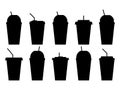 Black silhouettes of plastic or paper cups with straw icons set isolated on white background. Plastic cups for carbonated drinks. Royalty Free Stock Photo