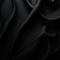 Black silk fabric with embossed diamond pattern , reflection, fabric, opulent Royalty Free Stock Photo
