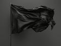 Black silk fabric flying. Silk cloth blowing in wind. Beautiful abstract background with little bit of light. Luxury Royalty Free Stock Photo