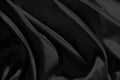 Black silk fabric wave of textile background Royalty Free Stock Photo