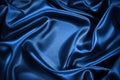 Black silk satin background. Shiny fabric with wavy folds. Beautiful fabric background with empty space Royalty Free Stock Photo