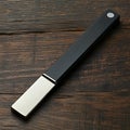 Black and silver knife sharpener