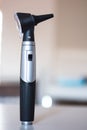 Otoscope used by doctor otolaryngologist to treat malete ears