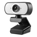 Black and silver webcam with adjustable clip on white background camera video Royalty Free Stock Photo