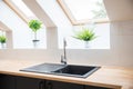 Black sink in the kitchen.