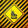 Black Skates icon isolated on yellow background. Ice skate shoes icon. Sport boots with blades. Warning sign. Vector