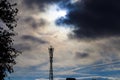 black sky. Telecommunication tower against a stormy cloudy sky Royalty Free Stock Photo