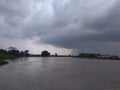 Black sky water the rain on sungai musi Royalty Free Stock Photo