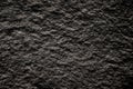 Black slate stone, dark grey texture patterns background Royalty Free Stock Photo