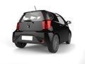 Black small urban modern electric car - taillight view