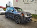 Black small 4WD car Jeep Renegade parked