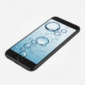 Black Smartphone Displaying Bubbles on a Blue Water Background mobile cell Royalty Free Stock Photo