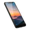 Black smartphone with a sunset landscape on its screen tilted on a white background mobile phone Royalty Free Stock Photo