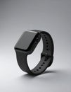 Black Smartwatch with Matching Band on Gray Gradient Background Royalty Free Stock Photo