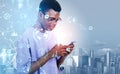 African man with smartphone in hands, graph hud with chart, cityscape
