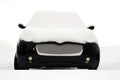 Black Smiling Minicar Under Snow Royalty Free Stock Photo