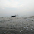 Black smoke coming out of a boat