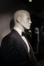 black smoking suit on mannequin in a fashion store showroom for men