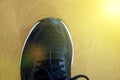 Black sneakers running shoes. Close up of men sport shoes.