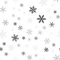 Black snowflakes pattern on white Christmas.