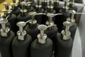 Black soap dispensers with silver caps close-up. Home interior details. bathroom detail Royalty Free Stock Photo