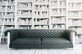 Black sofa in library Royalty Free Stock Photo