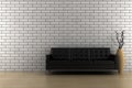 Black sofa and vase with dry wood Royalty Free Stock Photo