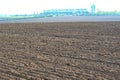 Black soil plowed field. Earth texture. Rustic background Royalty Free Stock Photo