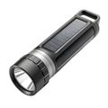 Black Solar Powered LED Flashlight with Textured Grip and Handle image photo Royalty Free Stock Photo
