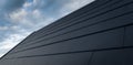 Black solar roof concept with cloudy sky in background.