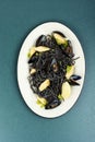 Black spaghetti pasta with clams