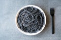 Black Spaghetti Pasta Flavored with Squid ink Cuttlefish or Inkfish. Royalty Free Stock Photo