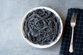 Black Spaghetti Pasta Flavored with Squid ink Cuttlefish or Inkfish. Royalty Free Stock Photo