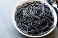 Black Spaghetti Pasta Flavored with Squid ink Cuttlefish or Inkfish. Royalty Free Stock Photo