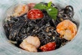 Black spaghetti with tiger prawn Royalty Free Stock Photo
