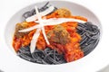 black spaghetti with tomato sauce with meat balls Royalty Free Stock Photo