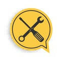 Black Spanner and screwdriver tools icon isolated on white background. Service tool symbol. Yellow speech bubble symbol